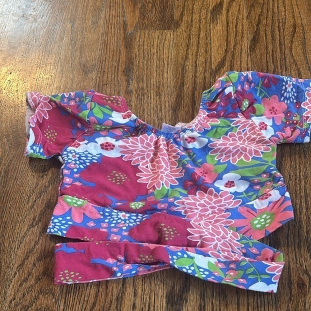 Two ISP dance crops, floral and black flutter sleeves